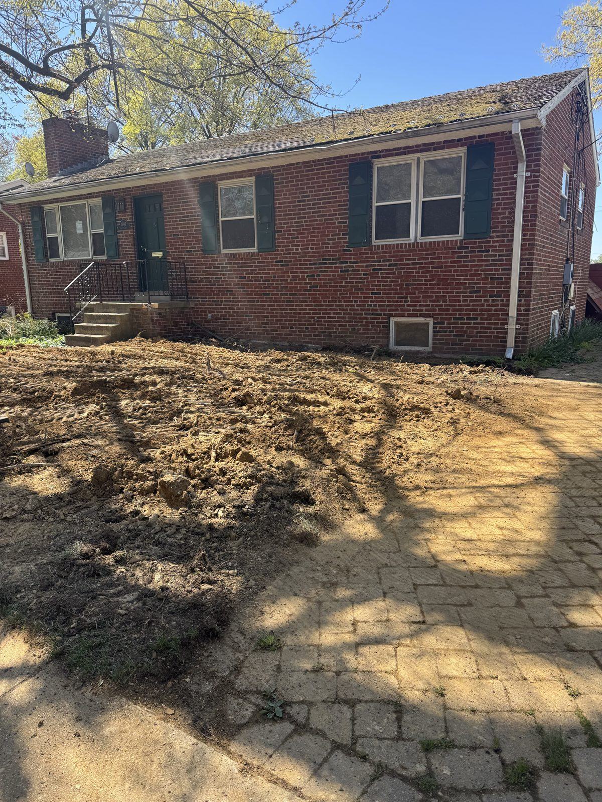 Original brick home before being knocked down and rebuilt